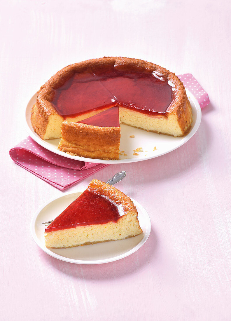 A base-less citrus cheesecake topped with redcurrant jelly