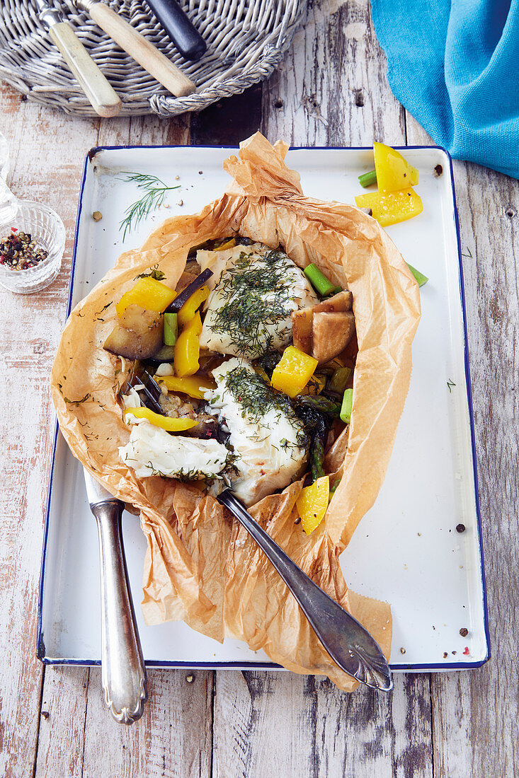 Oven-baked cod in baking paper