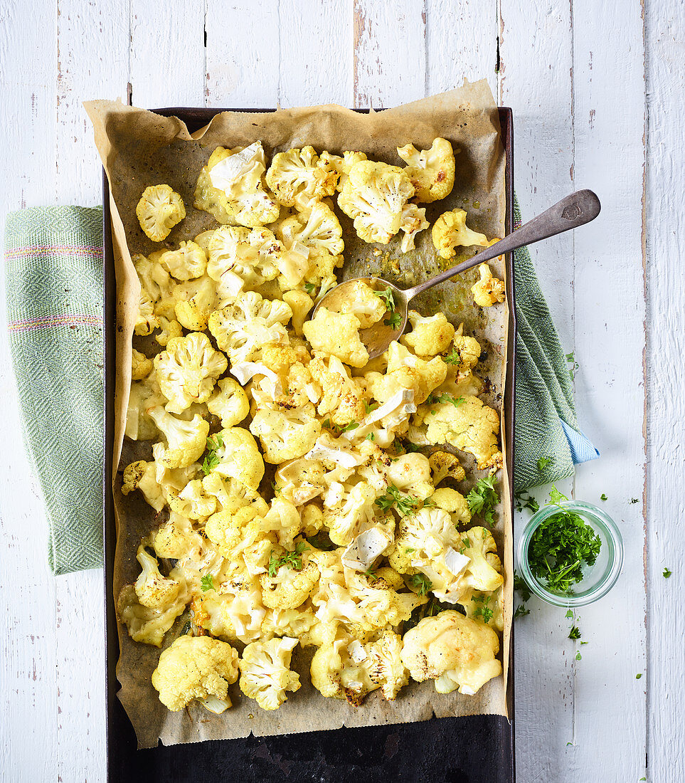 Baked cauliflower with masala and brie