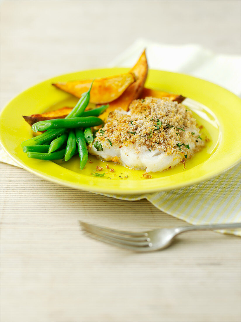 Baked cod with potato wedges and green beans