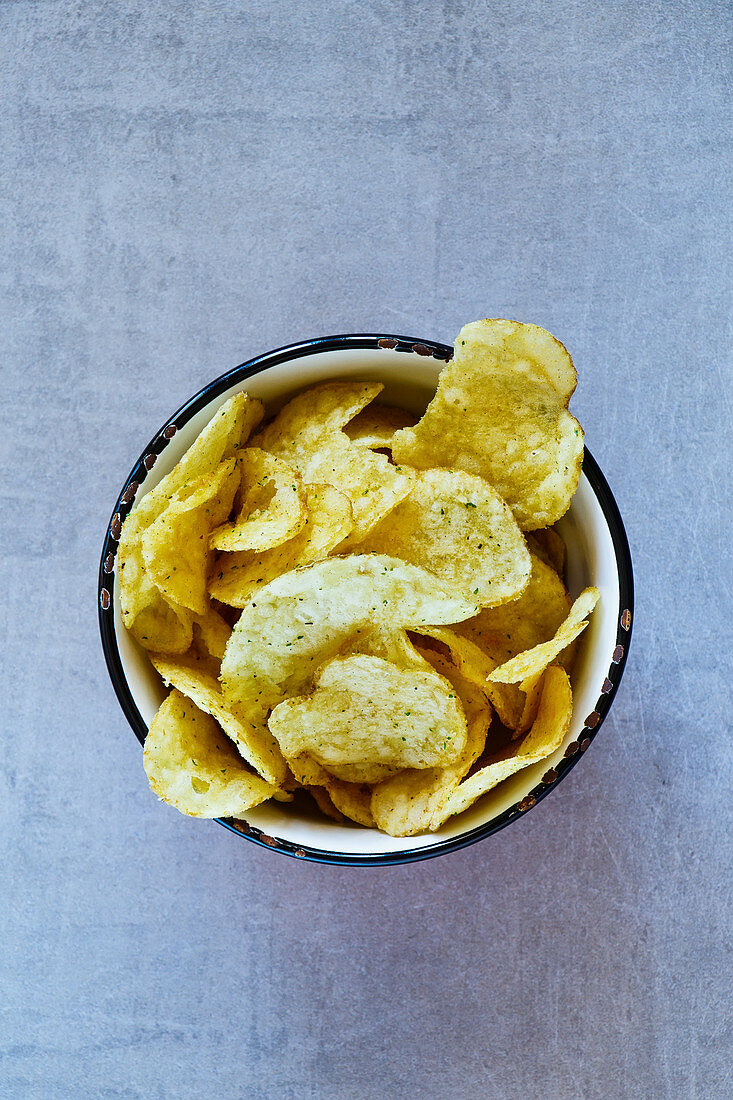 Crisps in a vintage cup (seen from above)