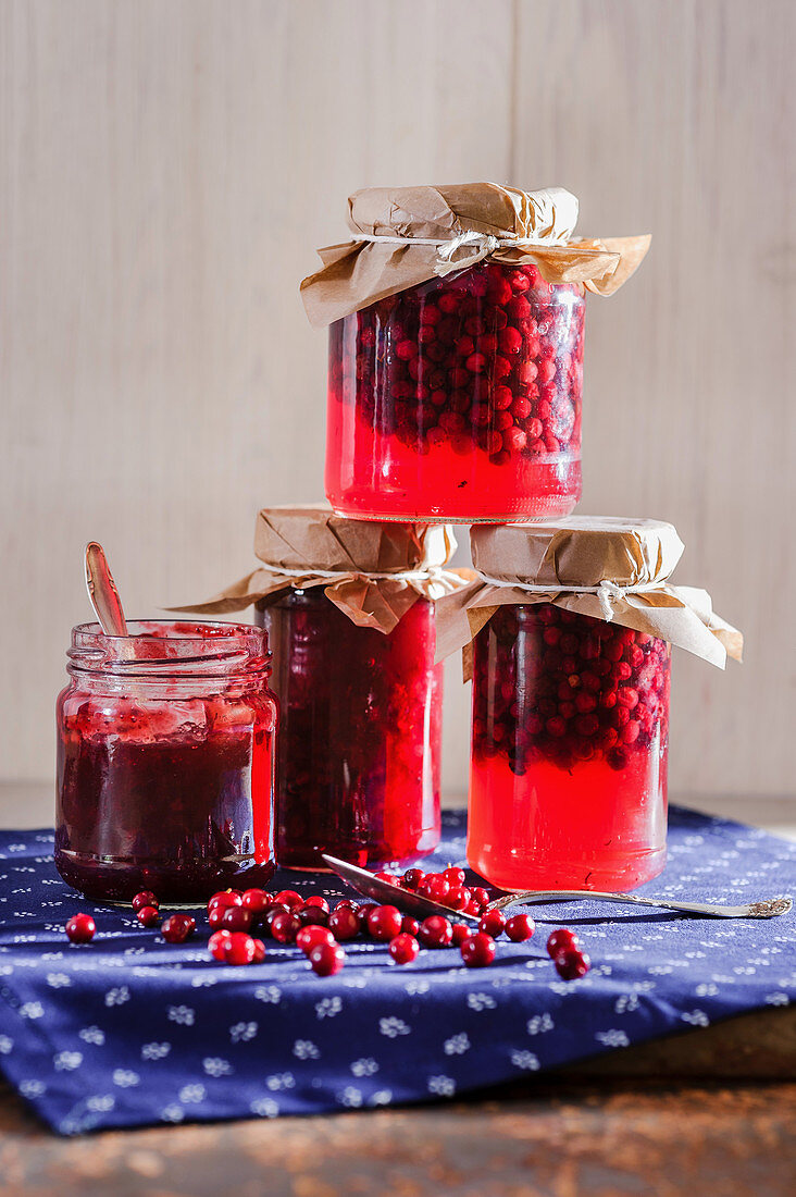 Jars of lingonberry compote and lingonberry jelly
