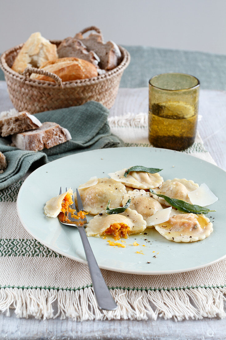 Pumpkin ravioli with sage and bread