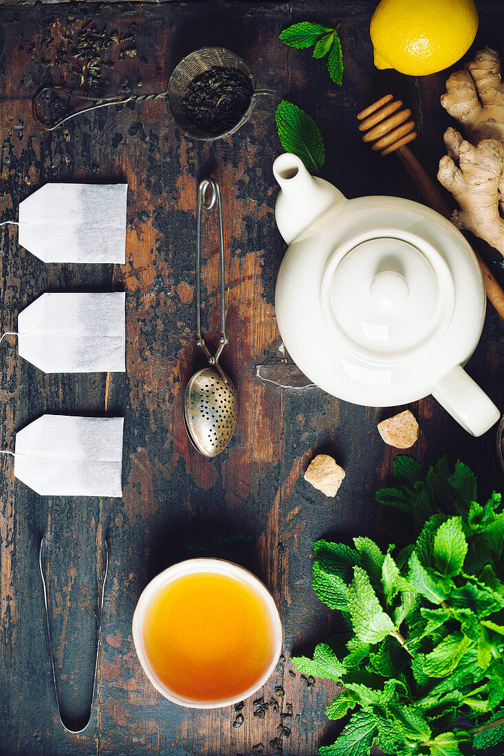 Tea composition on rustic background