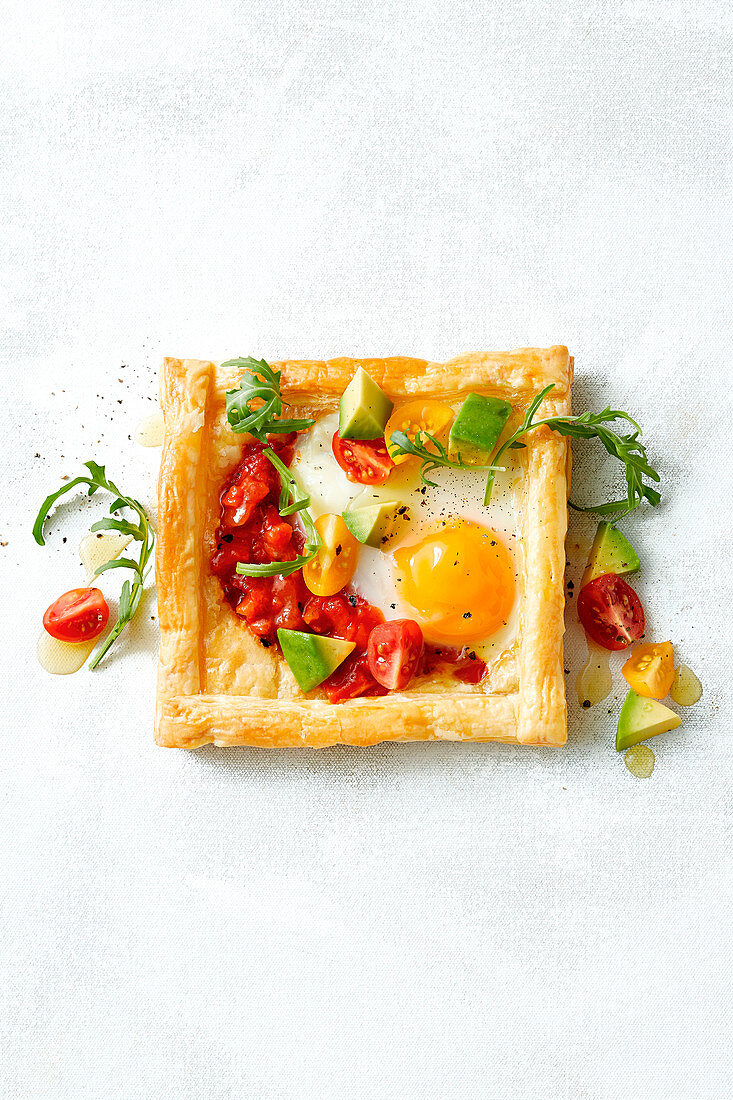 A vegetable tart with a fried egg for breakfast
