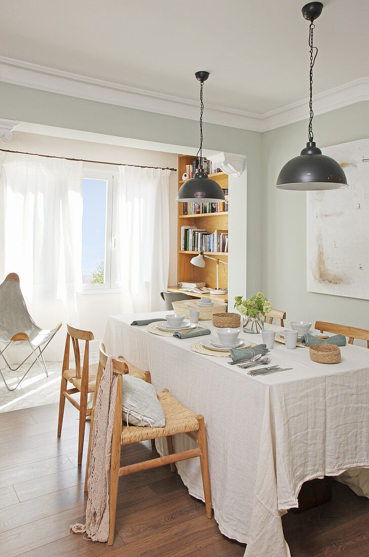 Table set in natural shades with crumpled tablecloth