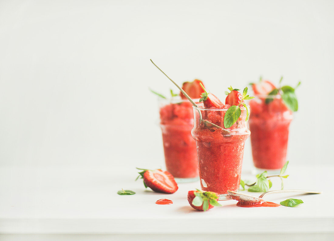 Healthy low calorie summer treat, Strawberry and champaigne granita, slushie or shaved ice dessert in glasses