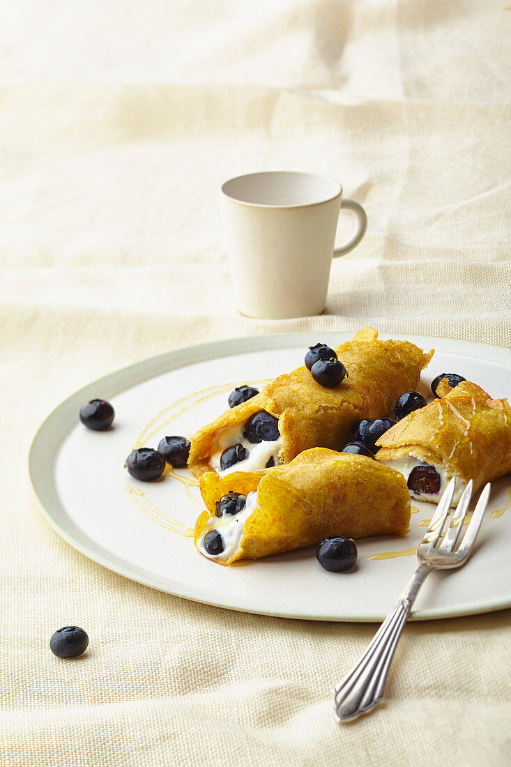 Pancakes filled with blueberries and quark