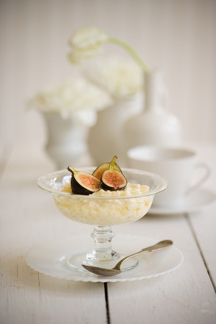 Figs and rice pudding on white