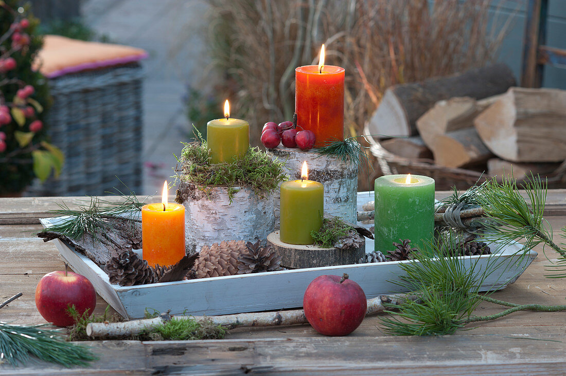 Tray With Candles On Little Pieces Of Trees