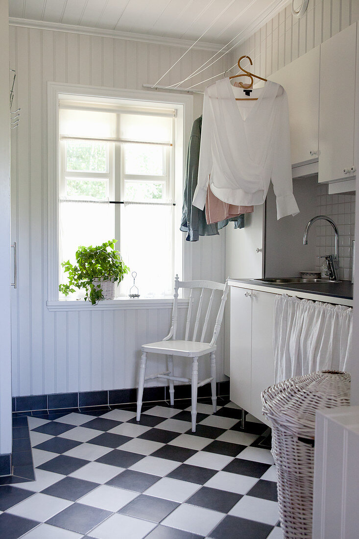 Rustic utility room with chequered floor