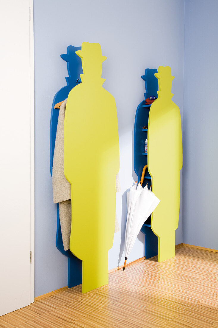 Colourful cloakroom stands in the shape of a man wearing a hat