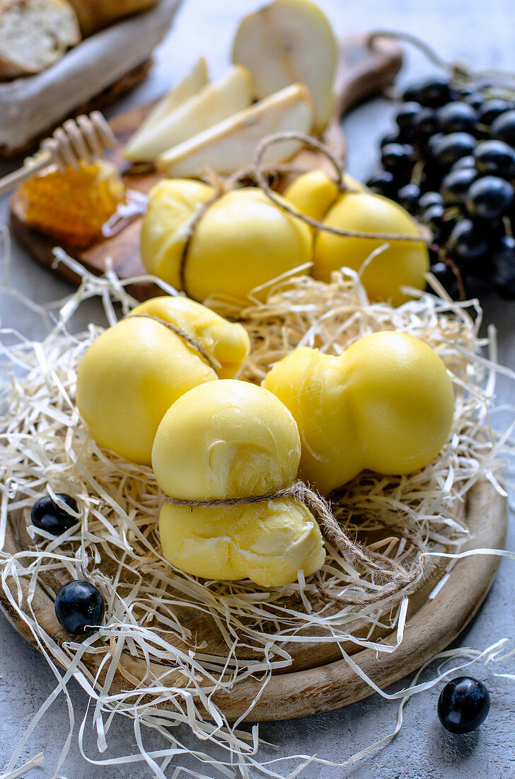 Aged mozzarella cheese and different appetizers for wine