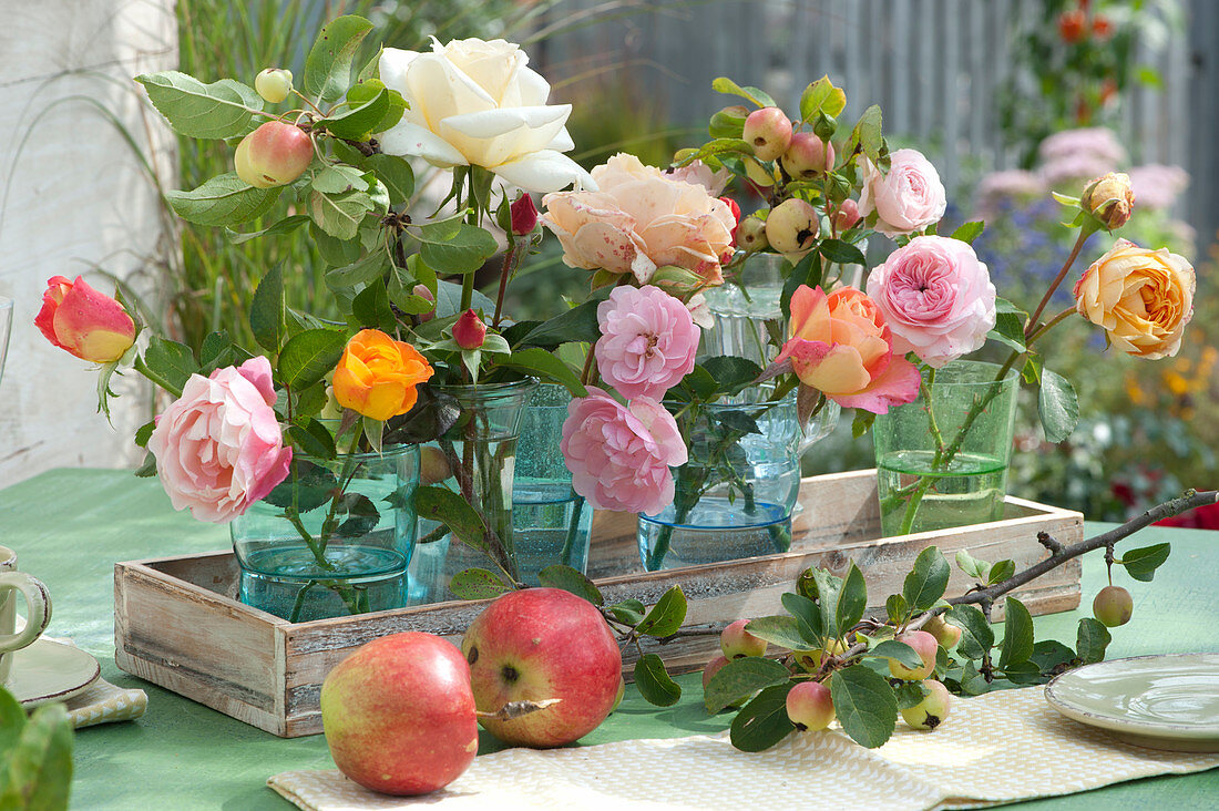 Glasses With Rose Petals And Ornamental Apple Branches