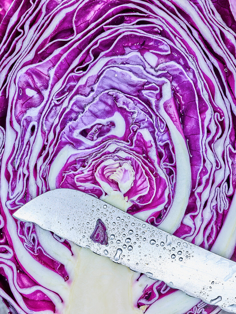 A halved red pointed cabbage (close-up)