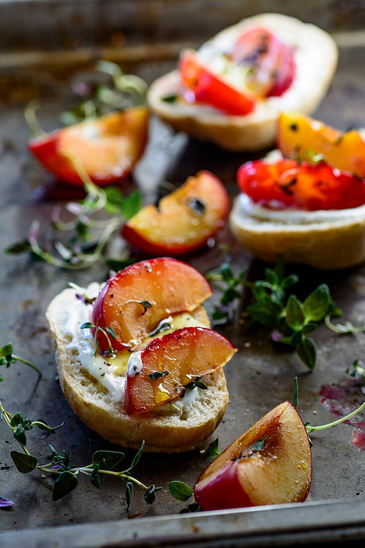 Rolls with baked plums with thyme honey and yoghurt