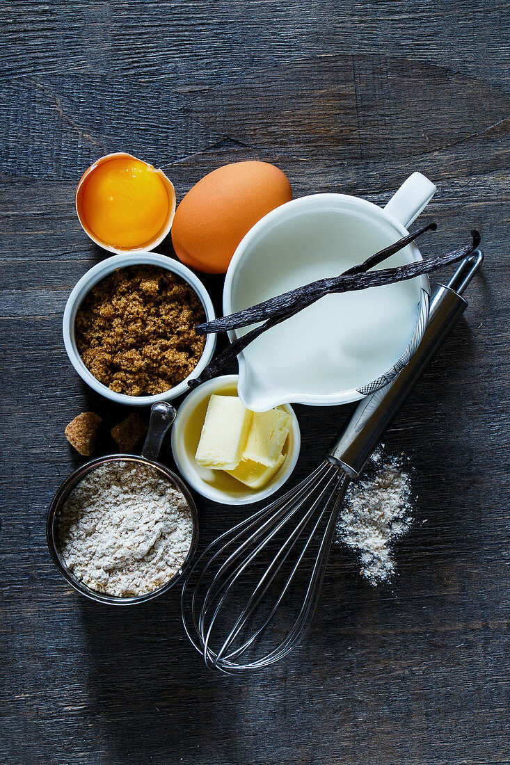 Still life with baking ingredients and utensils (top view)