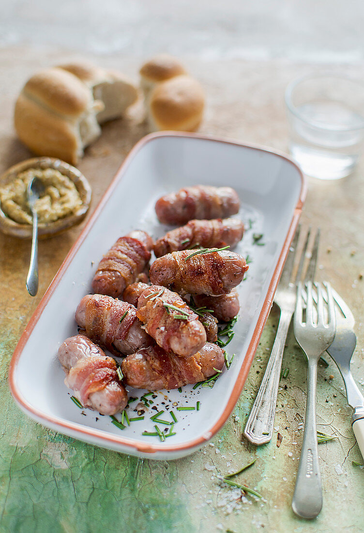 Mini sausage wrapped in bacon