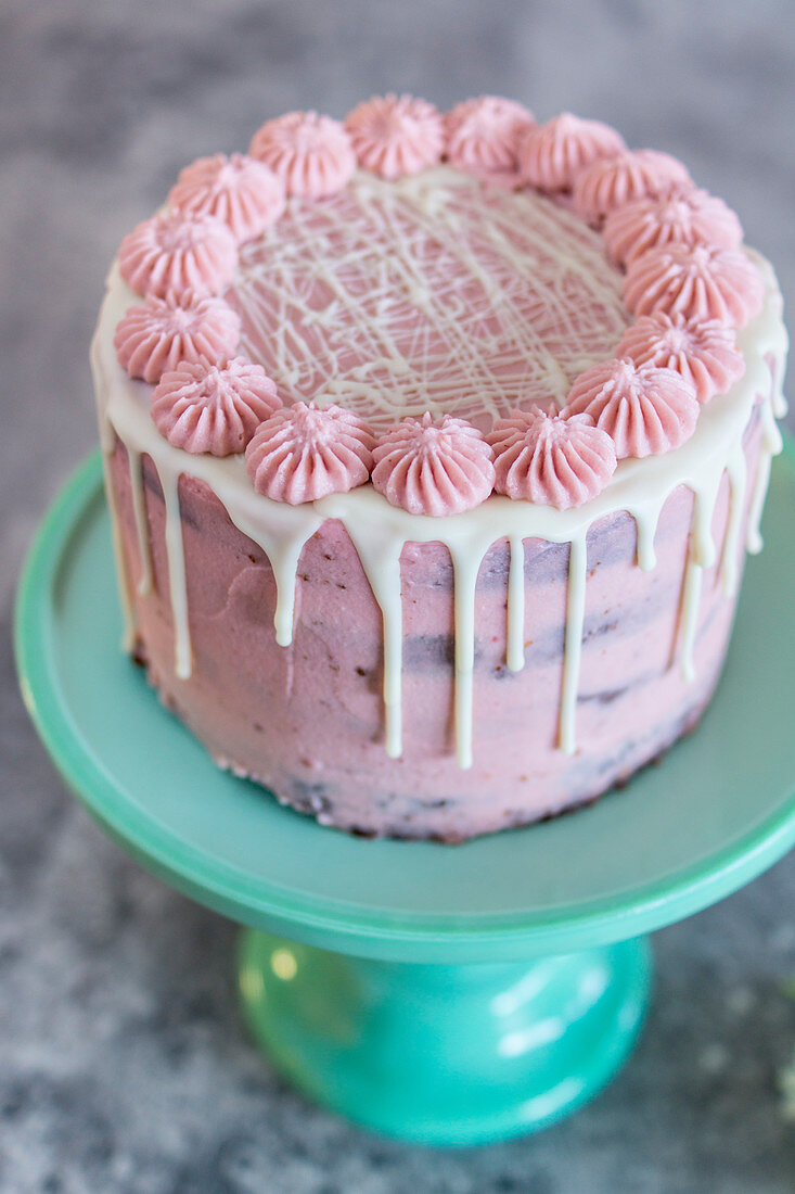 Chocolate cake with pink frosting
