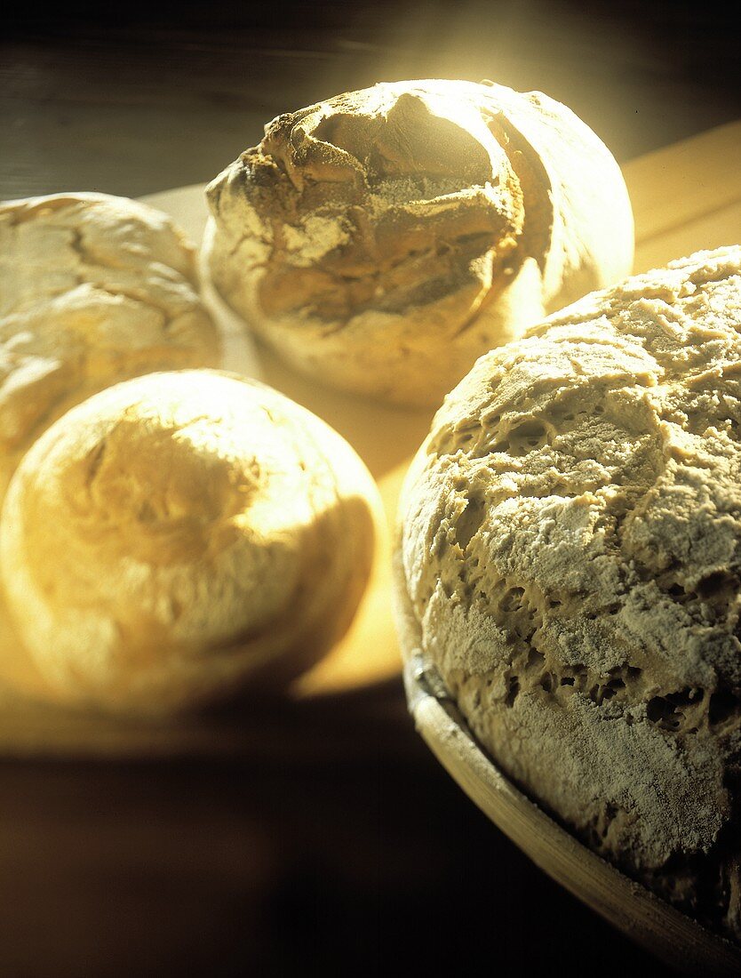 Four Round Loaves of Bread