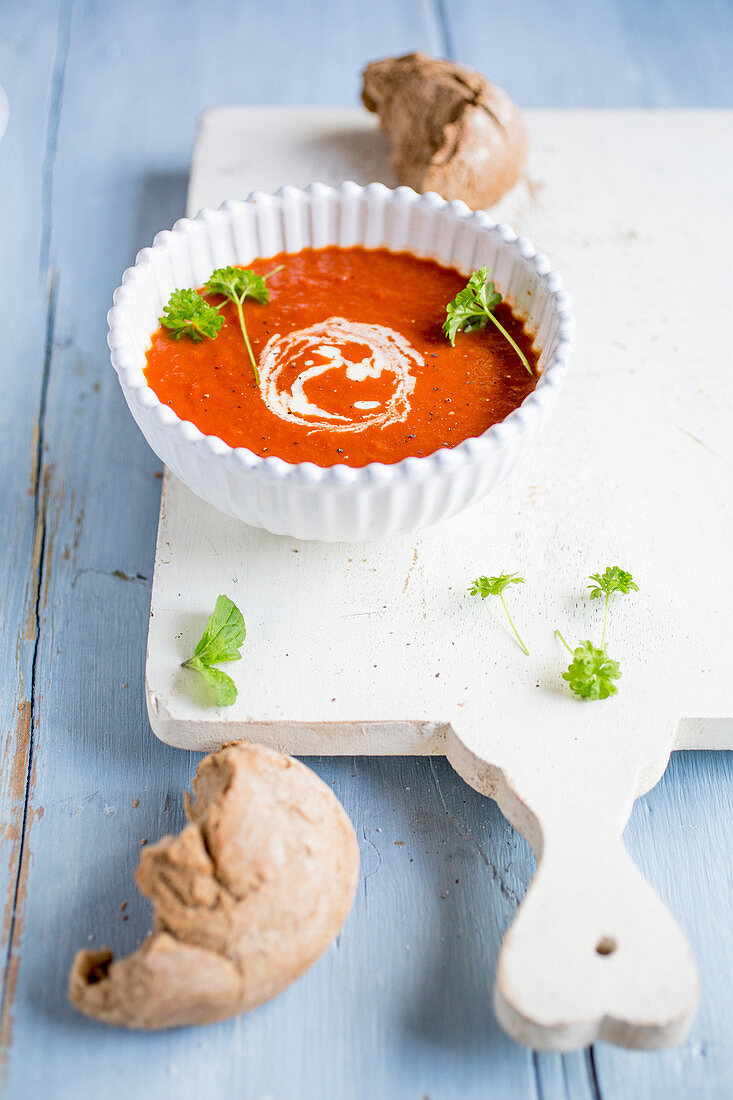 Tomato soup with parsley and rye bread
