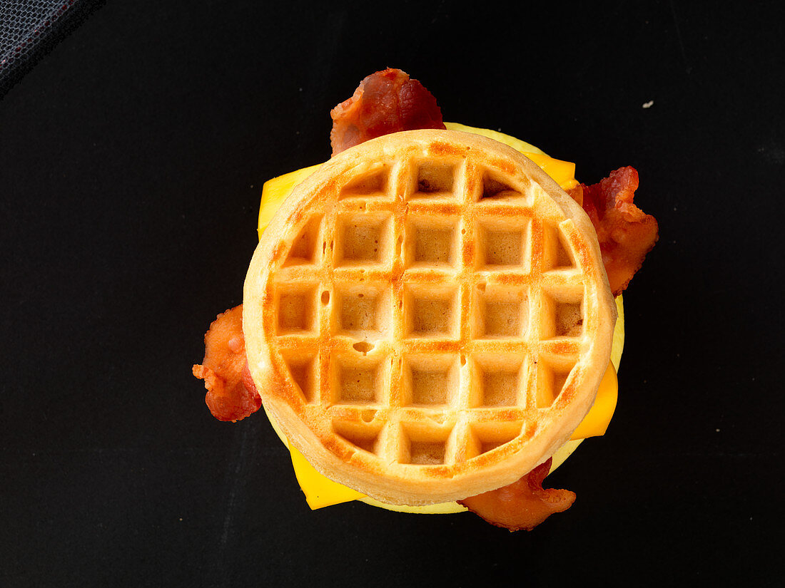 Waffles with egg, cheese and bacon