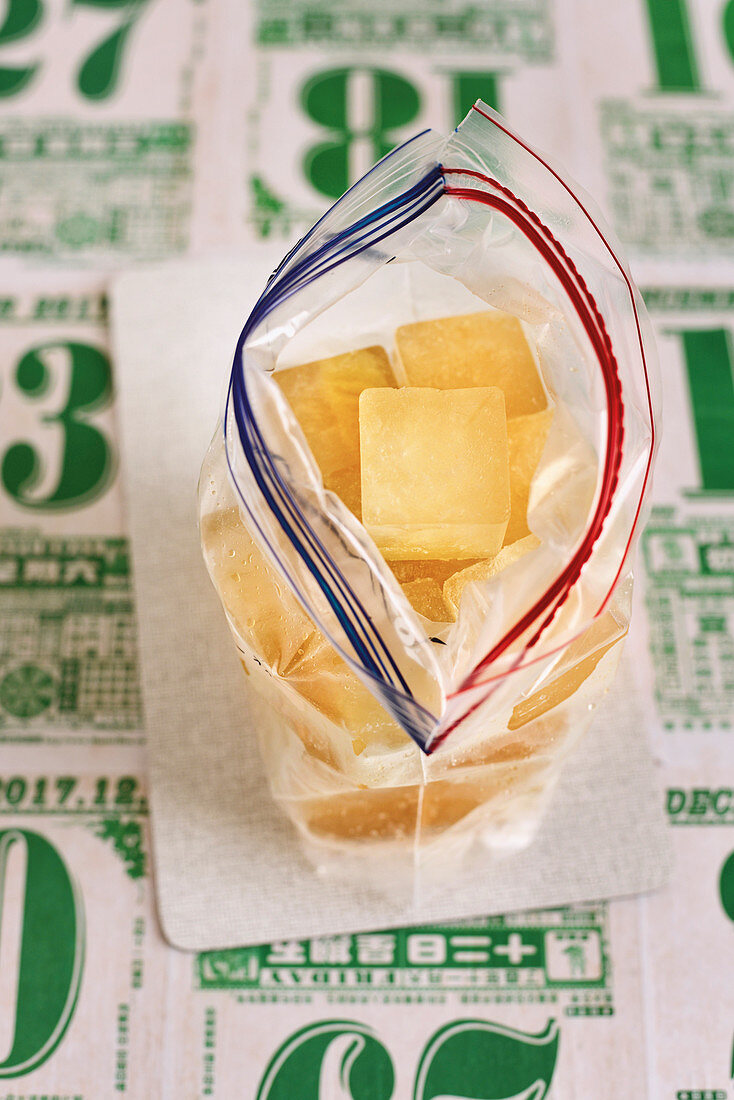 Portions of frozen chicken stock