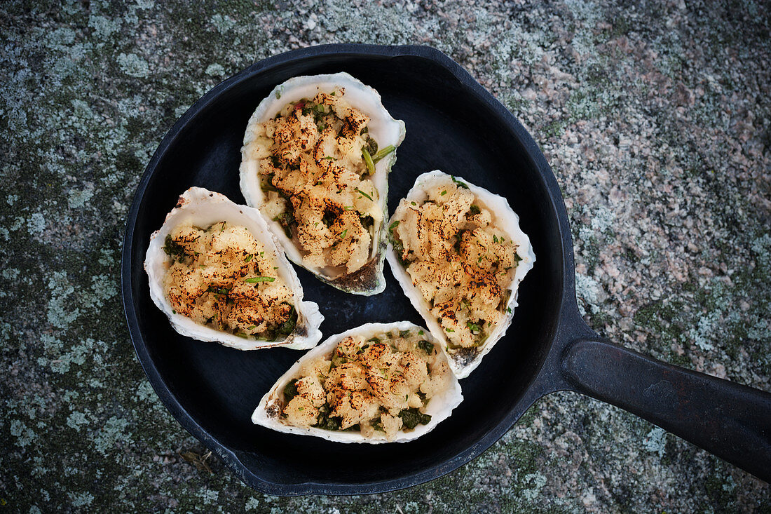 Oysters Rockefeller (gratinated oysters with spinach, USA)