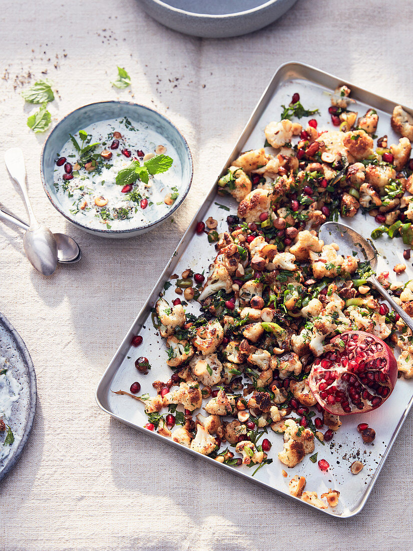 Roasted cauliflower with pomegranate seeds and mint