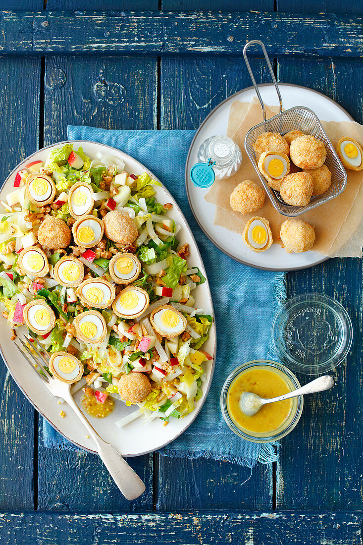 Salad with apple, quail eggs and mustard vinaigrette