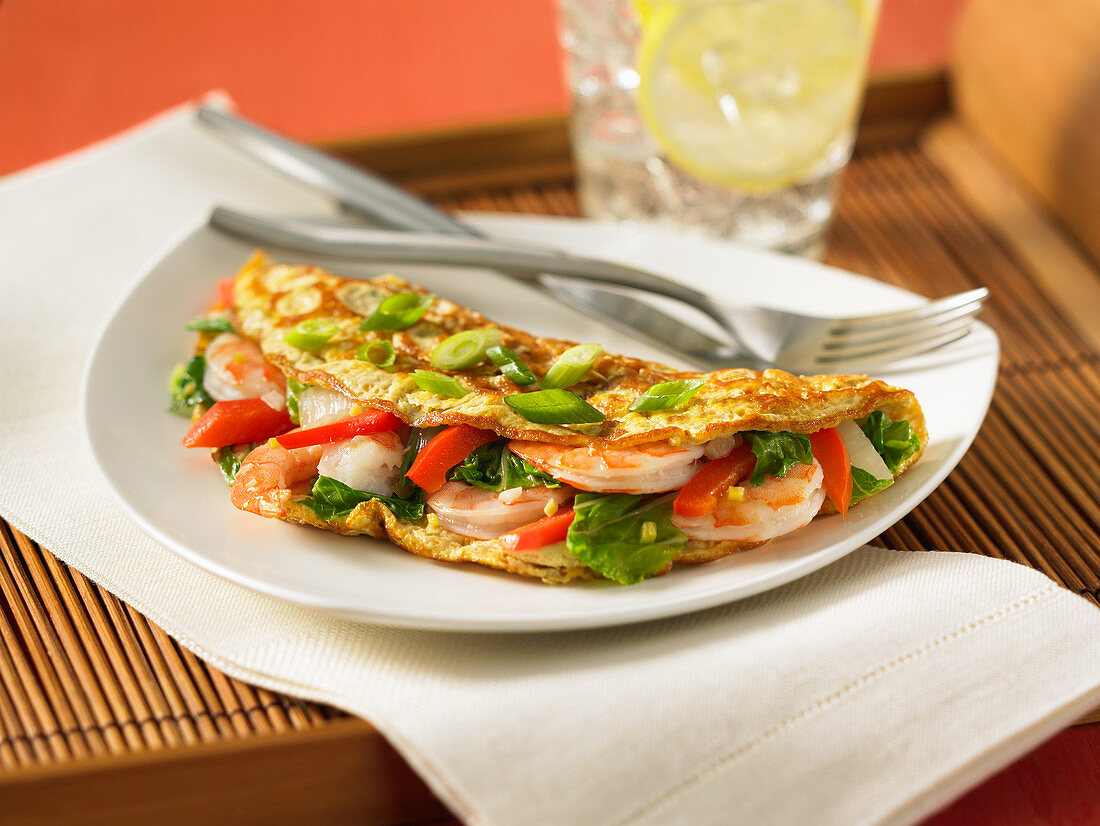 Shrimp omelette with peppers and spring onions