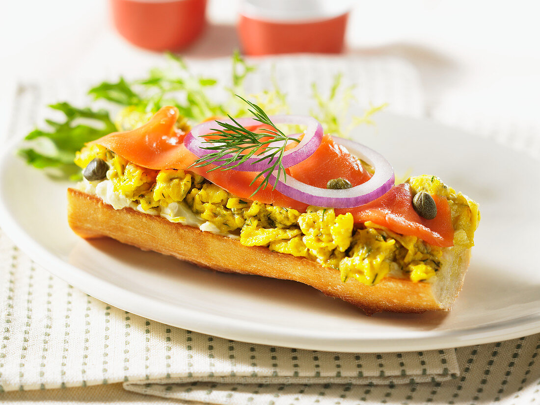 Baguette with scrambled eggs and smoked salmon