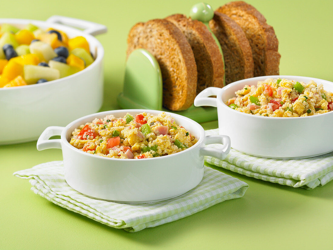 Couscous with scrambled eggs and vegetables for breakfast
