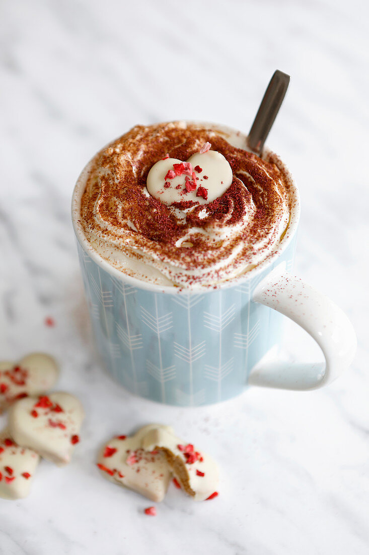 Hot Chocolate served with White chocolate coated heart biscuits