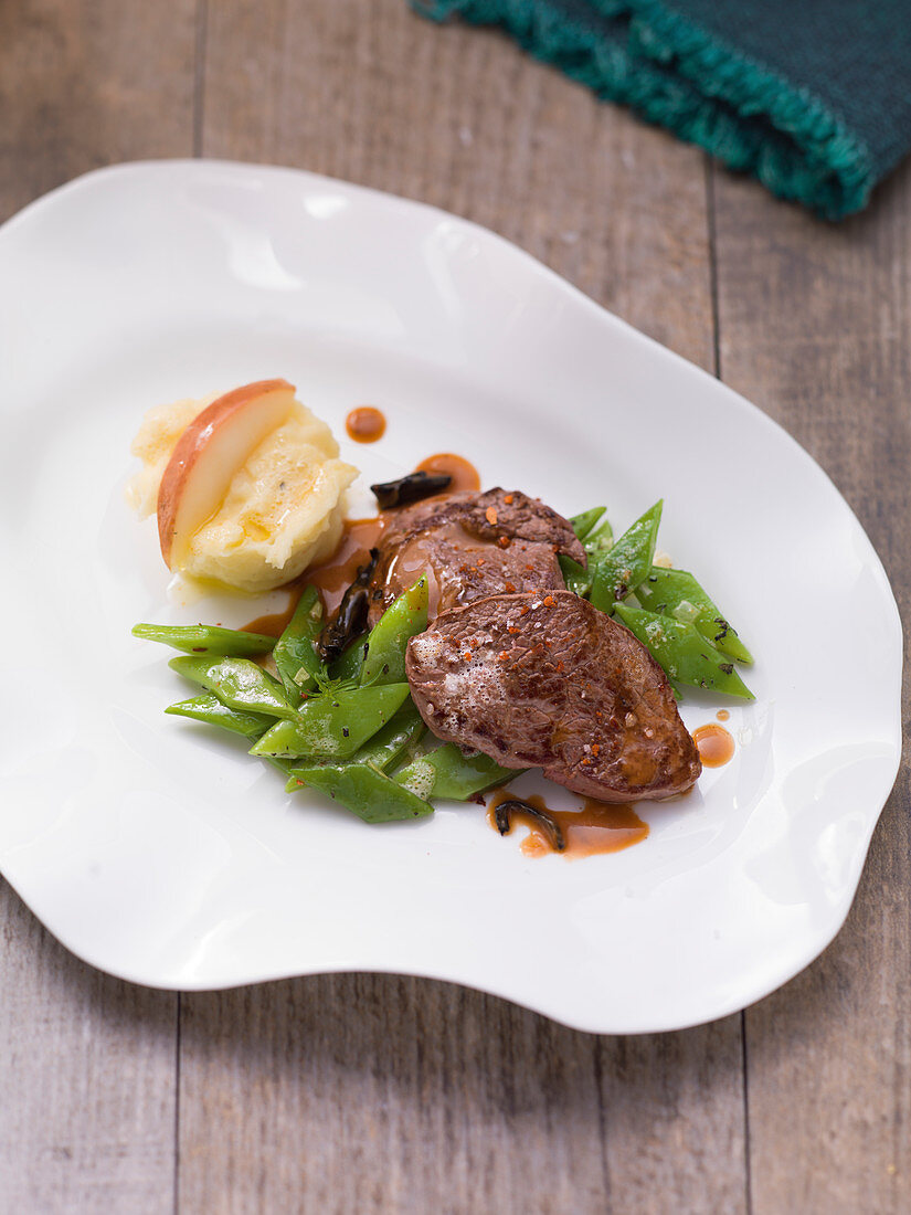 Ostrich steak with pear and potato puree and beans