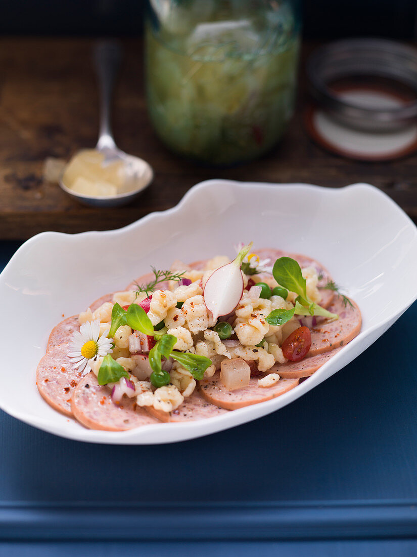 Regensburg sausage salad with spaetzle noodles and pickled cucumbers