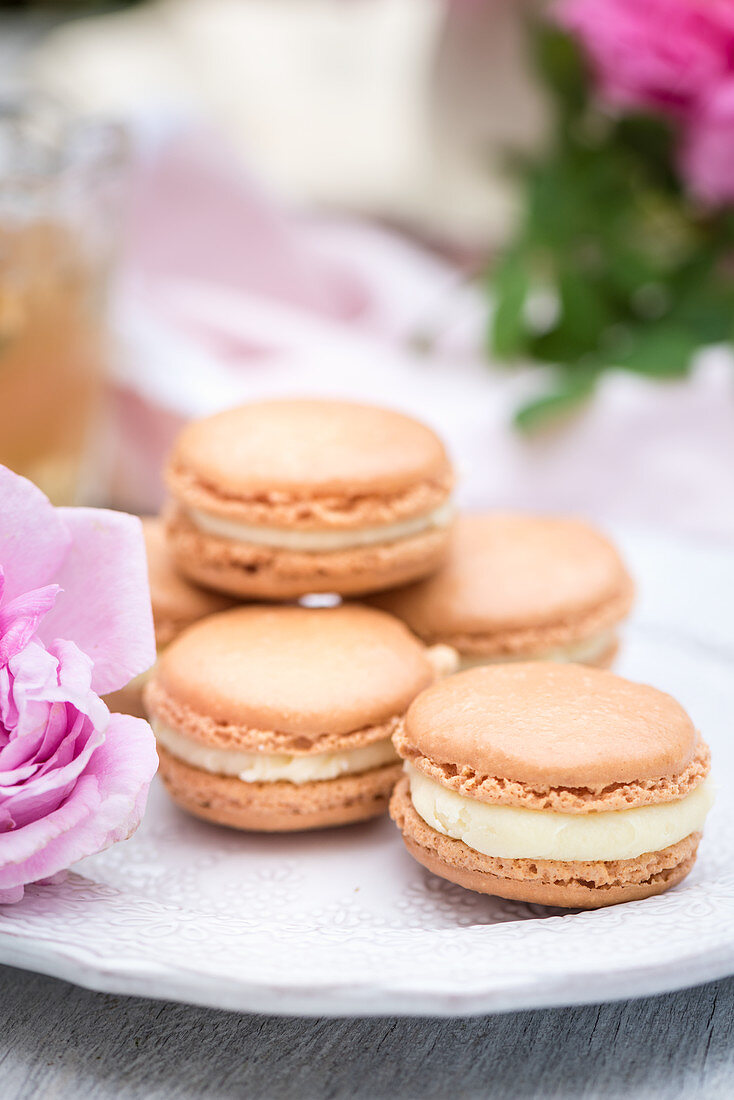 Rose macaroons filled with white chocolate