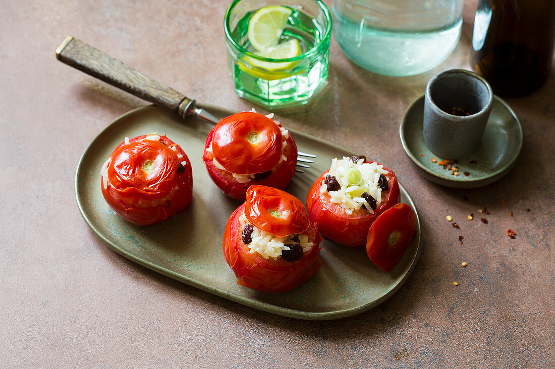 Steamed tomatoes filled with feta cheese and rice