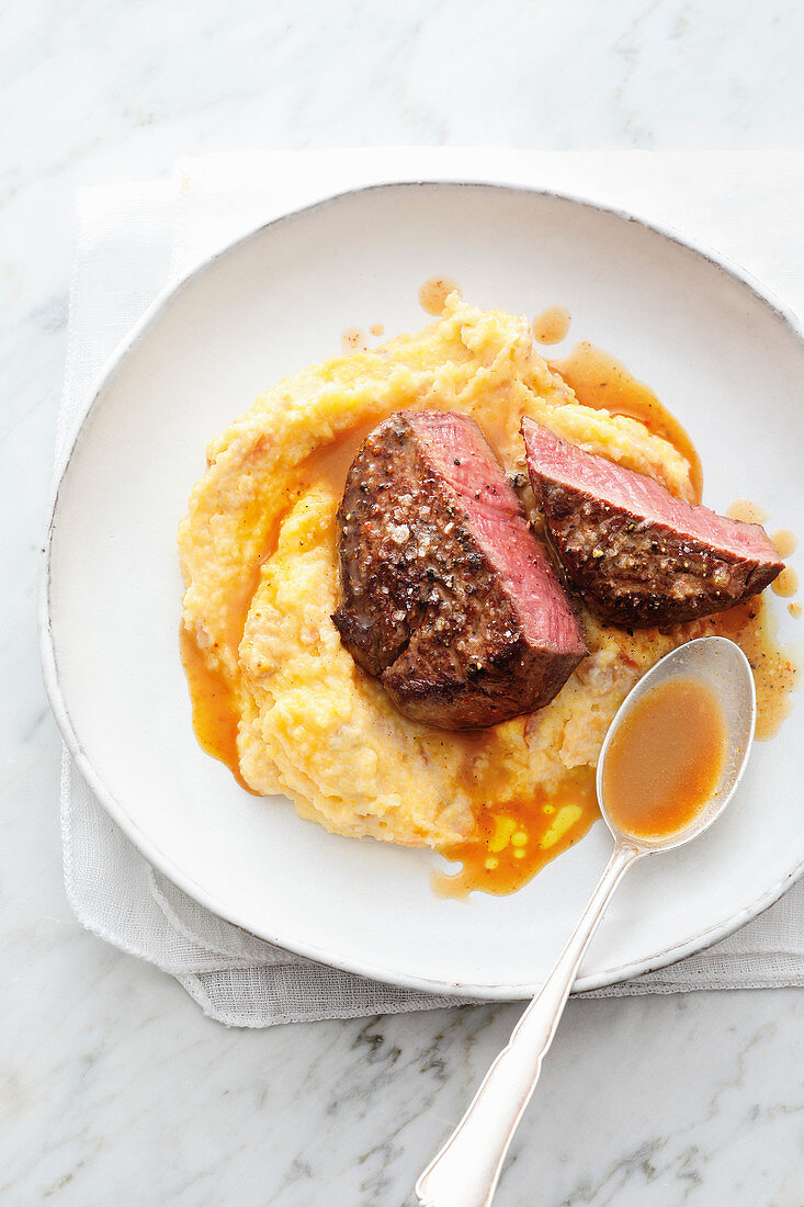 Beef fillets with polenta and almond puree