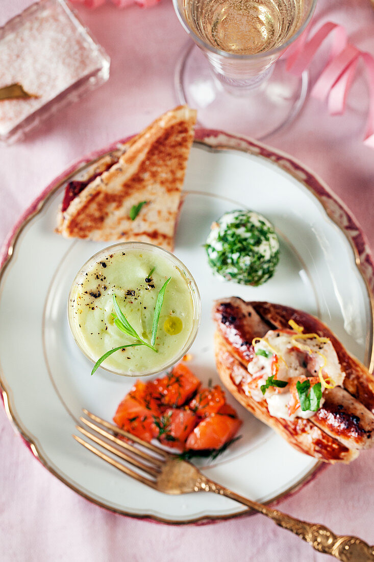 Cheese balls, avocado soup, toast, salmon and hot dogs for a New Year's Eve party