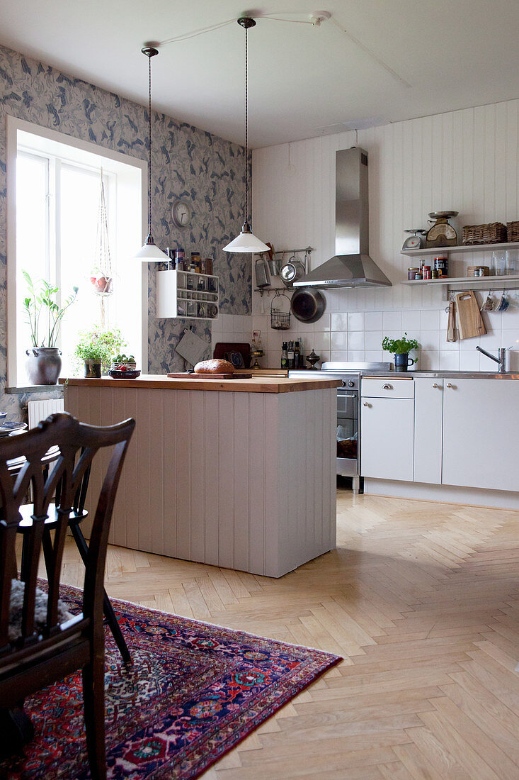 Open-plan kitchen-dining room in country-house style