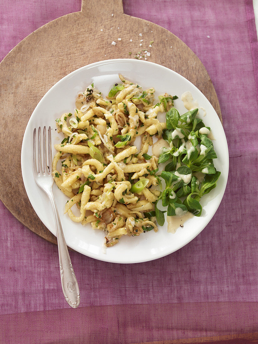 Cheese spaetzle with corn salad and potato dressing