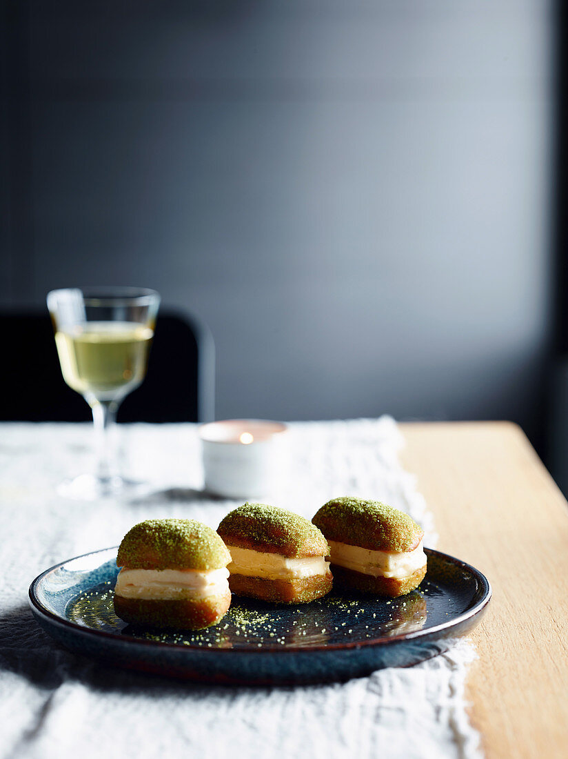 Honey and ginger ice-cream and lemon curd doughnut sandwiches