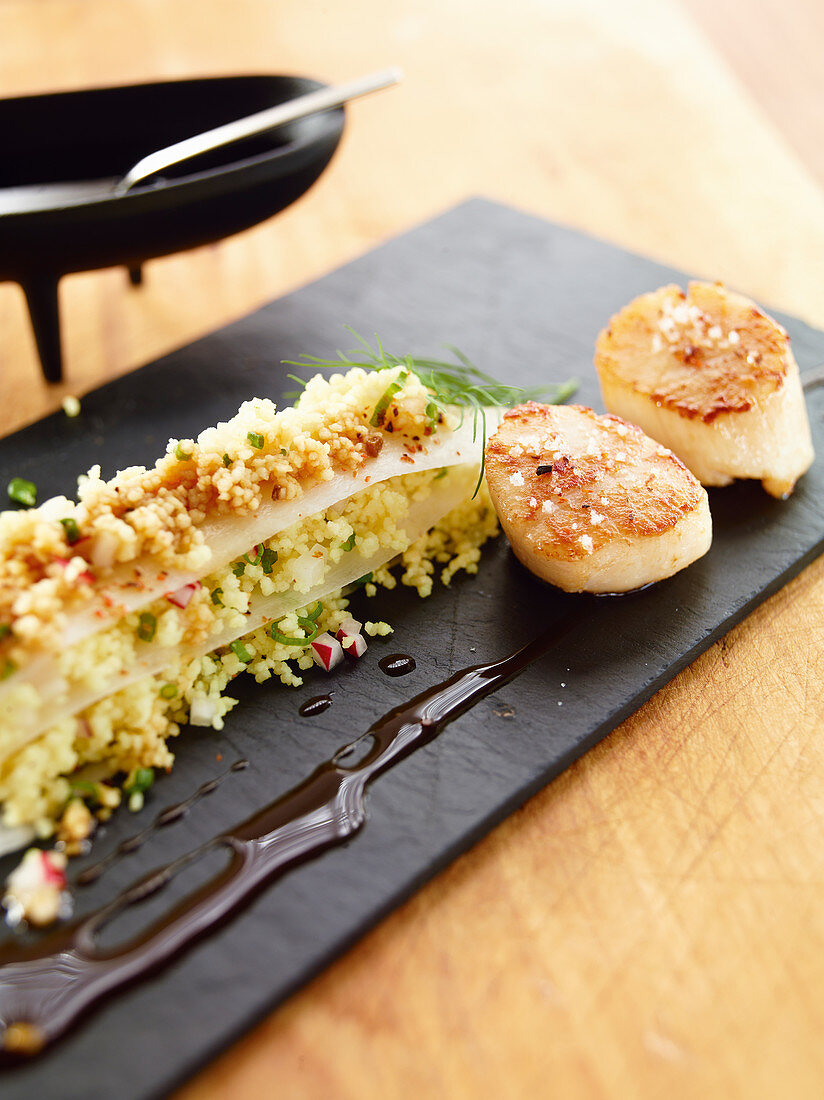 Scallops with couscous and teriyaki sauce
