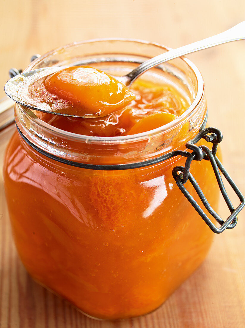 Apricot sauce in a flip-top jar