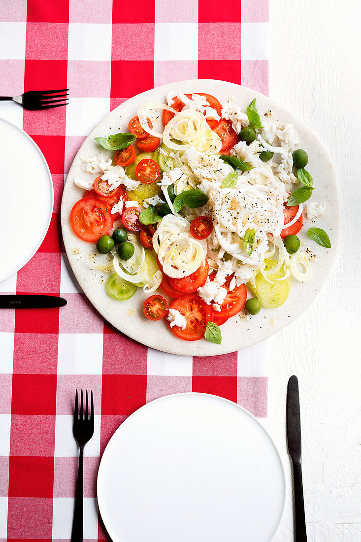 Crab and calamari salad with mixed tomatoes