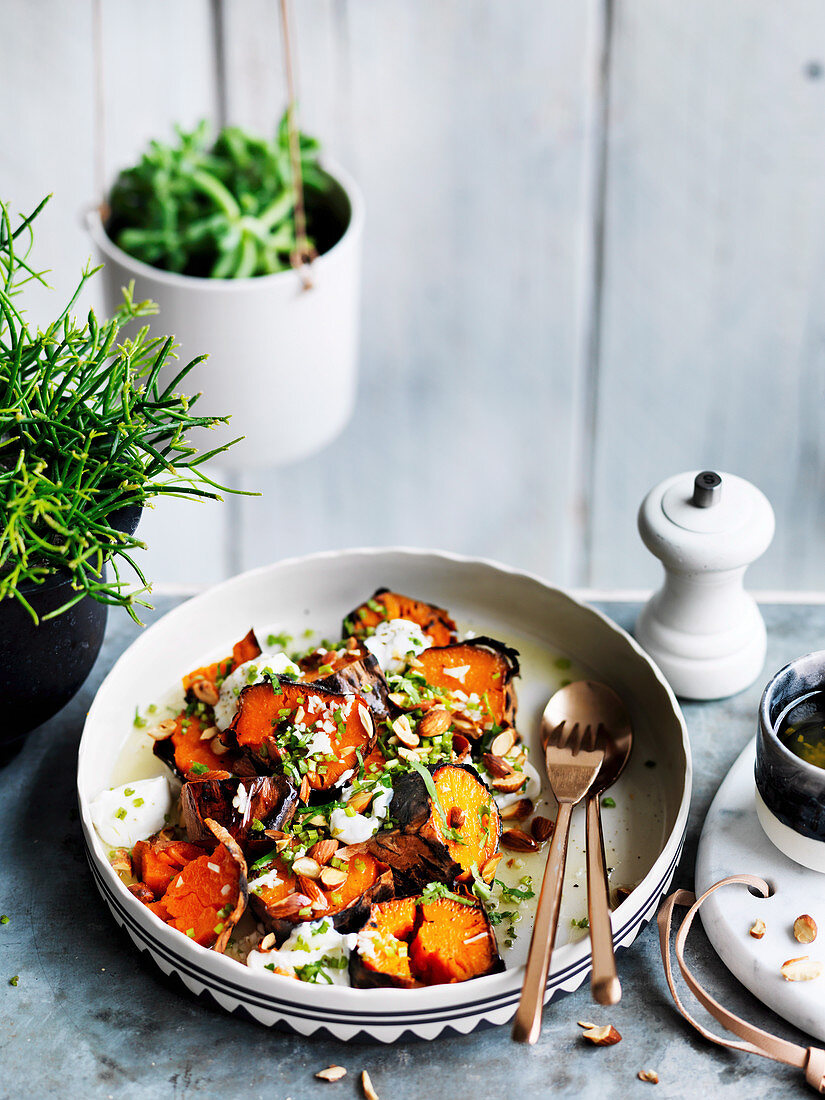 Charred sweet potato, goats curd and almonds