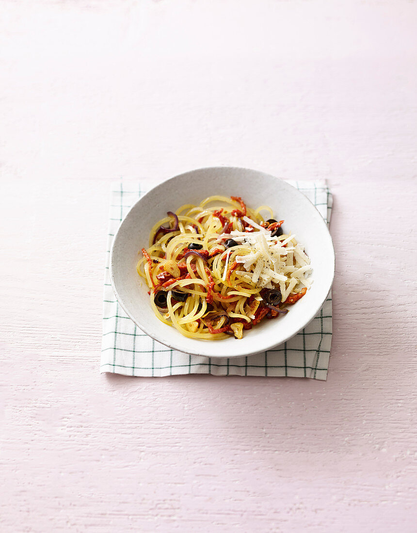 Potato pasta with olives, dried tomatoes and Parmesan