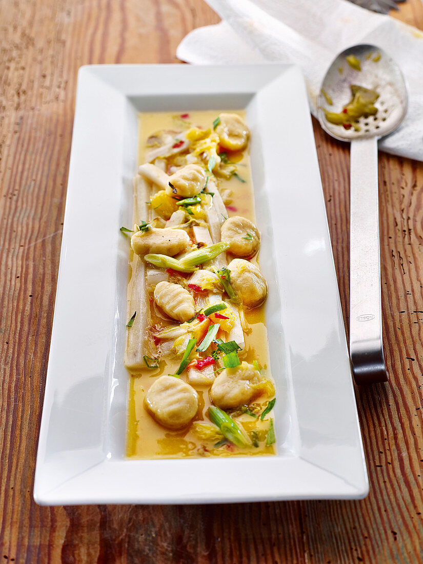 Coffee gnocchi with orange and chicory
