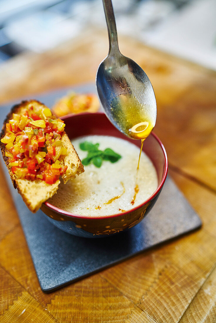 White bean soup with peppers and chorizo toast